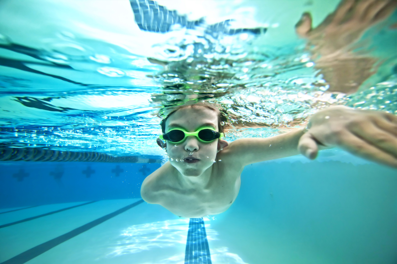kid swimming laps